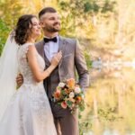 man in gray suit and woman in white wedding dress