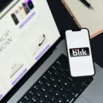 A laptop computer sitting on top of a desk