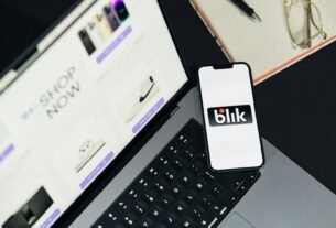 A laptop computer sitting on top of a desk