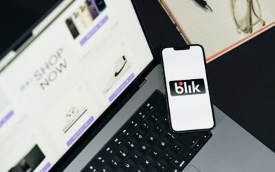 A laptop computer sitting on top of a desk