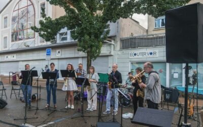 A group of people playing music on a street